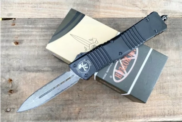 Combat Troodon D/E OTF Knife Black (3.8" Damascus) Combat Troodon D/E OTF Knife Black (3.8" Damascus)