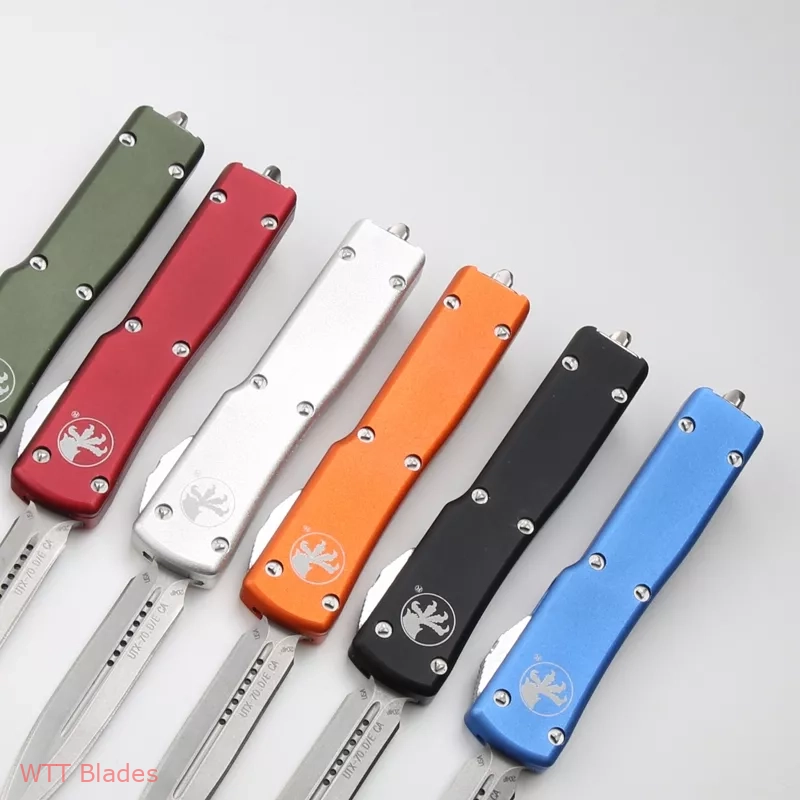 UTX-70 D/E OTF Automatic Knife Red (2.4" Stonewash) (3) UTX-70 D/E OTF Automatic Knife Red (2.4" Stonewash) (3)