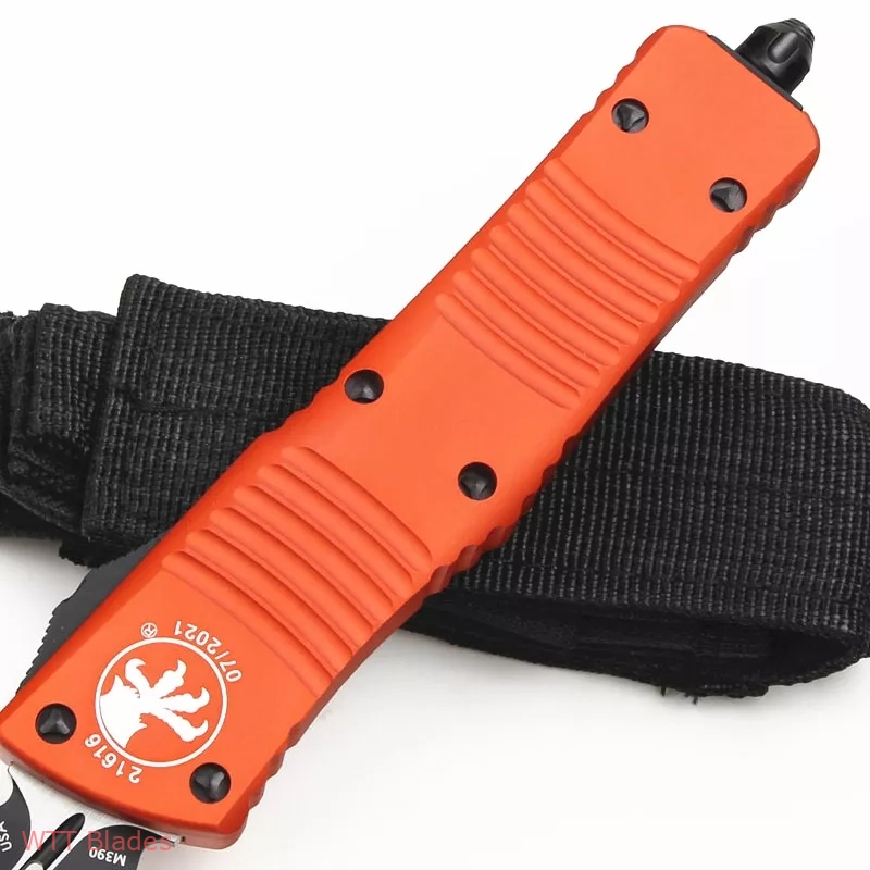 MT Combat Troodon D/E OTF Automatic Knife Orange (3.8" Black) (3) MT Combat Troodon D/E OTF Automatic Knife Orange (3.8" Black) (3)