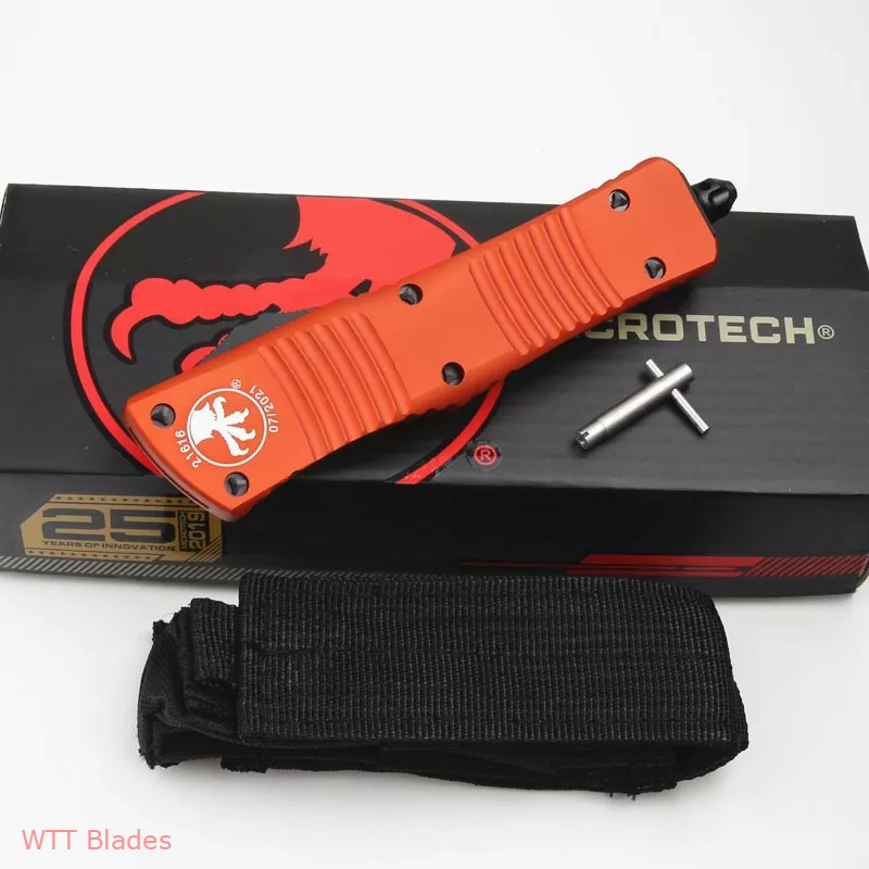 MT Combat Troodon D/E OTF Automatic Knife Orange (3.8" Black) (7) MT Combat Troodon D/E OTF Automatic Knife Orange (3.8" Black) (7)