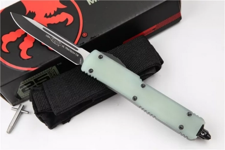 Signature Series UTX-70 S/E OTF Auto Knife Jade G-10 (2.4" Black) Signature Series UTX-70 S/E OTF Auto Knife Jade G-10 (2.4" Black)