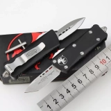 Troodon Mini D/E CA Legal OTF Automatic Black-2 (1.9" SW) (4) Troodon Mini D/E CA Legal OTF Automatic Black-2 (1.9" SW) (4)