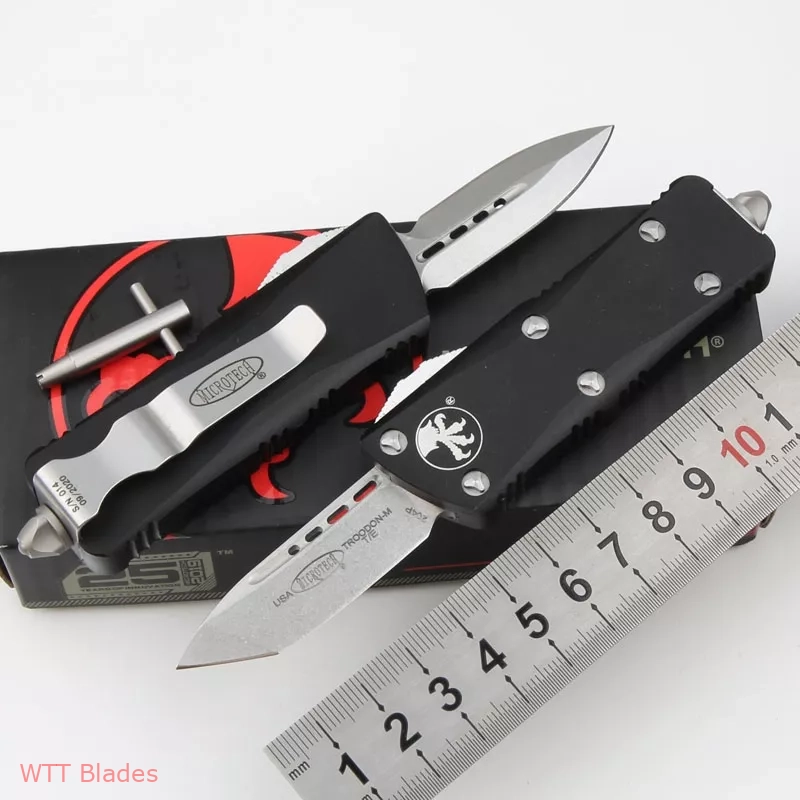 Troodon Mini D/E CA Legal OTF Automatic Black-2 (1.9" SW) (4) Troodon Mini D/E CA Legal OTF Automatic Black-2 (1.9" SW) (4)