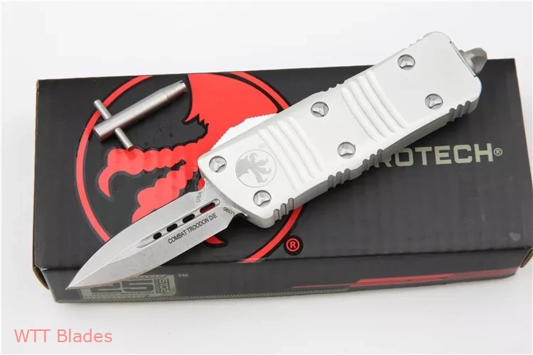 Troodon Mini D/E CA Legal OTF Automatic White (1.9" SW) Troodon Mini D/E CA Legal OTF Automatic White (1.9" SW)