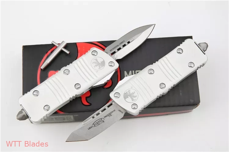 Troodon Mini D/E CA Legal OTF Automatic White (1.9" SW) (2) Troodon Mini D/E CA Legal OTF Automatic White (1.9" SW) (2)