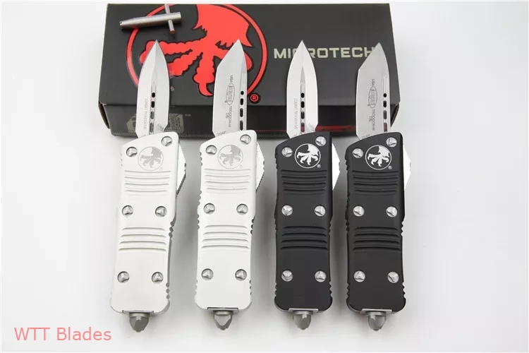Troodon Mini D/E CA Legal OTF Automatic White (1.9" SW) (6) Troodon Mini D/E CA Legal OTF Automatic White (1.9" SW) (6)