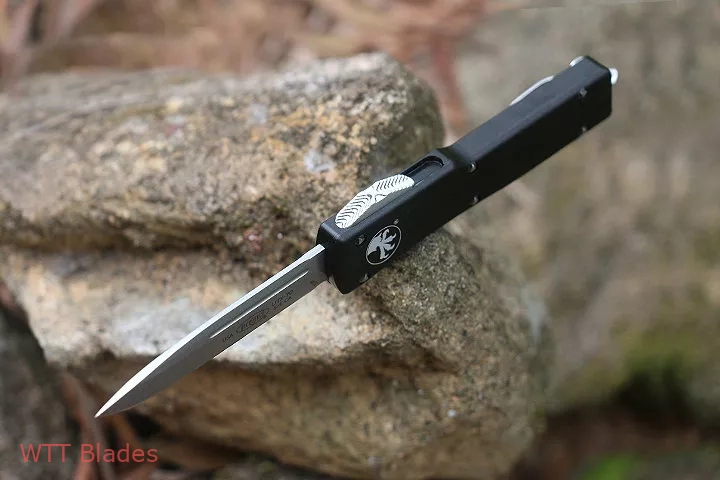 UTX-70 D/A OTF S/E Automatic Knife Black (2.4" Stonewash) (6) UTX-70 D/A OTF S/E Automatic Knife Black (2.4" Stonewash) (6)