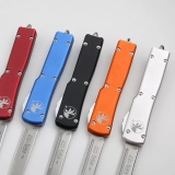 UTX-70 D/A OTF S/E Automatic Knife Silver (2.4" Stonewash) (5) UTX-70 D/A OTF S/E Automatic Knife Silver (2.4" Stonewash) (5)