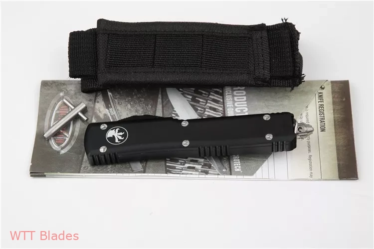 UTX-70 D/E OTF Automatic Knife (2.4" Damascus) (8) UTX-70 D/E OTF Automatic Knife (2.4" Damascus) (8)