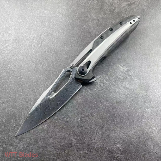 ZT 0990 Frame Lock Knife Carbon Fiber (3.25" Damascus) (2) ZT 0990 Frame Lock Knife Carbon Fiber (3.25" Damascus) (2)