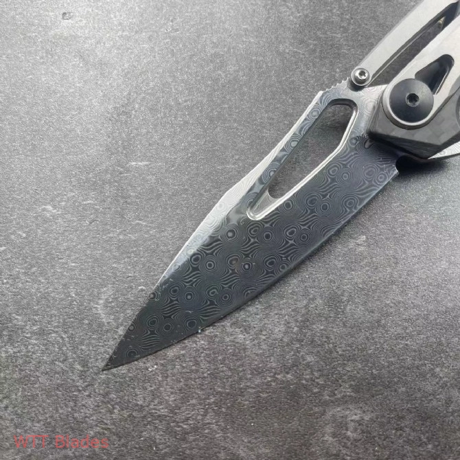 ZT 0990 Frame Lock Knife Carbon Fiber (3.25" Damascus) (5) ZT 0990 Frame Lock Knife Carbon Fiber (3.25" Damascus) (5)
