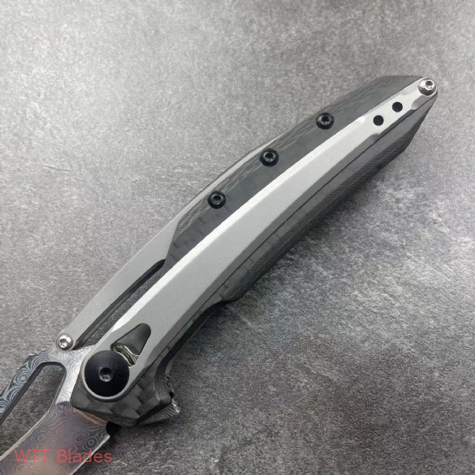 ZT 0990 Frame Lock Knife Carbon Fiber (3.25" Damascus) (6) ZT 0990 Frame Lock Knife Carbon Fiber (3.25" Damascus) (6)